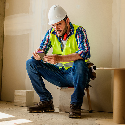 Construction worker working on a business degree through SOAR